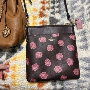 Deep burgundy/brown with pink roses cross body coach bag